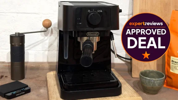 The De'Longhi Stilosa espresso machine on a kitchen worktop. To the right of the machine, a circular badge reads 'Approved Deal"