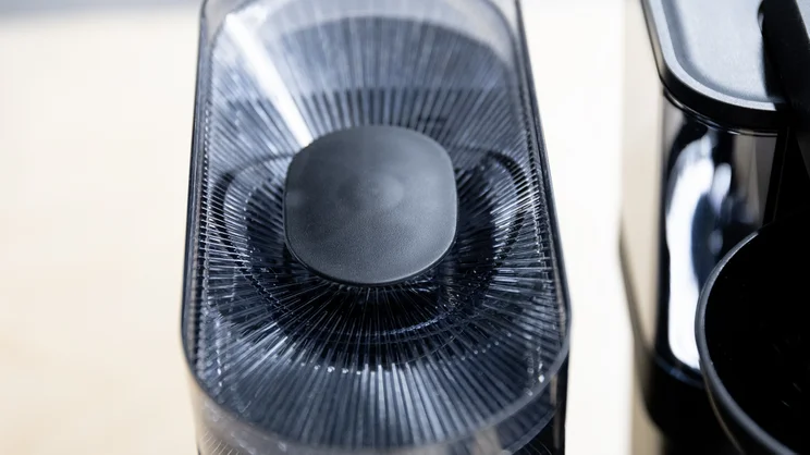 The Melitta EPOS filter coffee machine's bean hopper, with lid removed