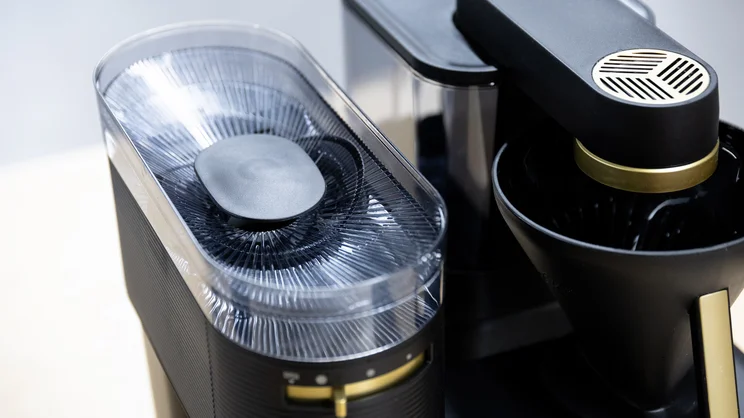 The Melitta EPOS filter coffee machine's bean hopper, with lid removed