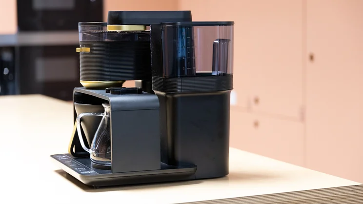 A side view of the Melitta EPOS filter coffee machine on a kitchen worktop