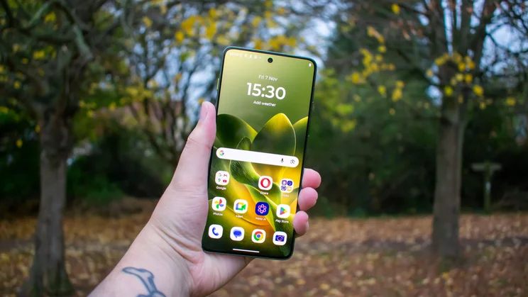 Motorola Edge 70 in hand with the display on