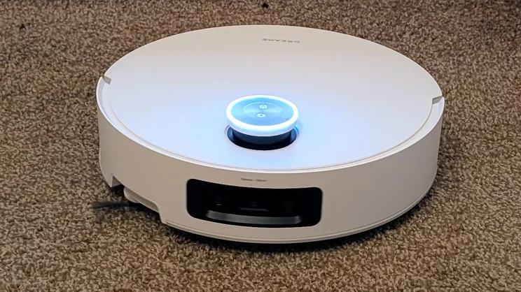 The Dream Aqua10 Ultra Roller on a brown carpet