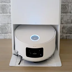 A close up of the Dream Aqua10 Ultra Roller docked in its base station