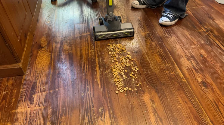 The Ryobi 18V ONE+ Cordless Stick pictured before carrying out a test to see how many Cheerios it would clean on hard floor