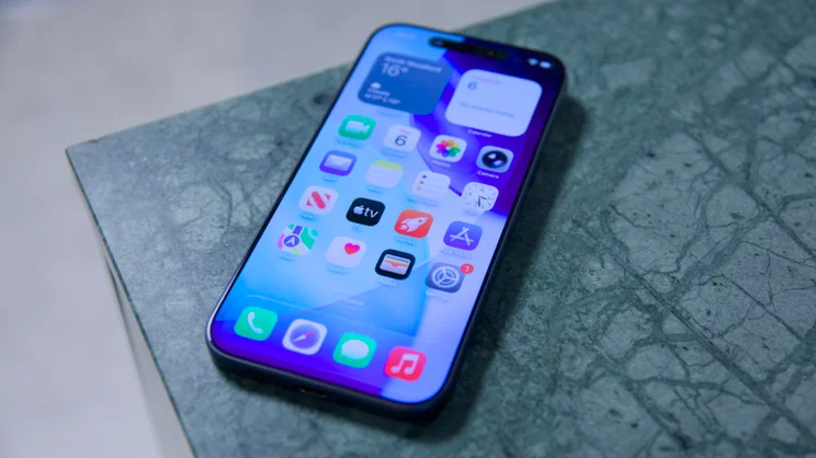 Angled view of the Apple iPhone 17 Pro Max screen-up on a marbled table