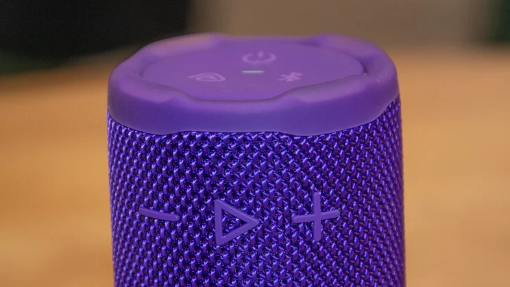 The playback and volume control buttons on the front of the JBL Grip portable Bluetooth speaker