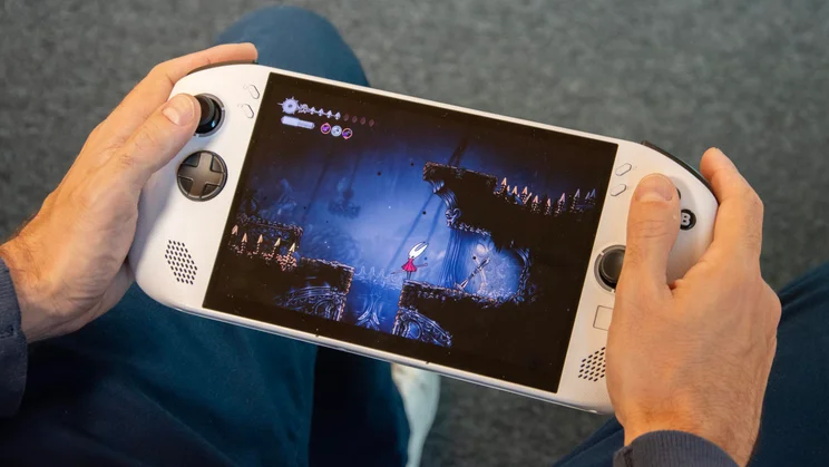 Right view of our reviewer playing Hollow Knight: Silksong on the Lenovo Legion Go S