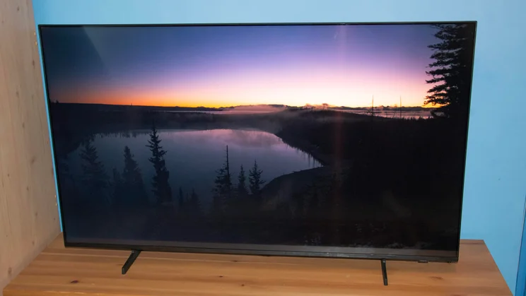 Front view of the Samsung U8000F 4K TV displaying a lake sunset scene