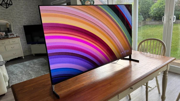Left view of the Sony Bravia 8 II QD-OLED TV displaying a rainbow colour pattern