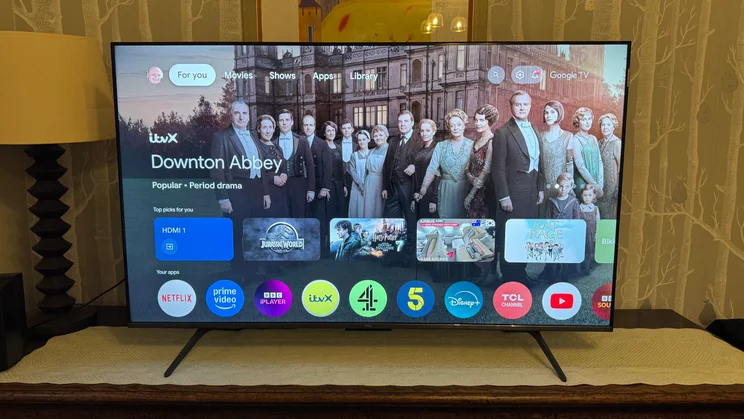 Front view of the TCL C6KS Mini LED TV displaying the Google TV homepage