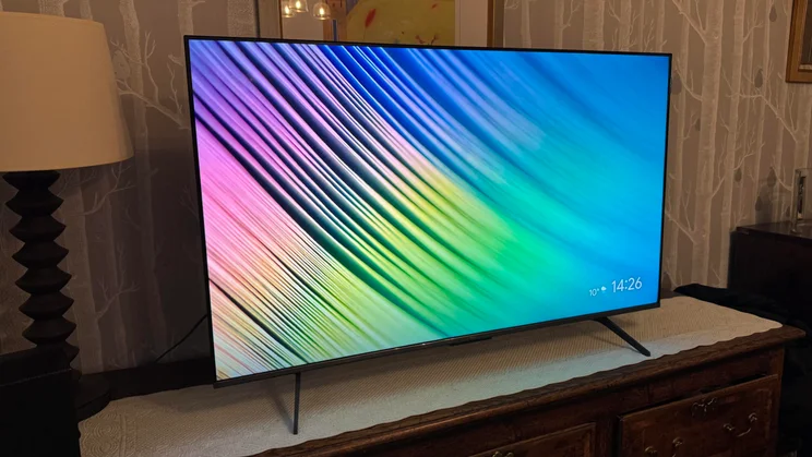 Left view of the TCL C6KS Mini LED TV displaying a multicolour pattern