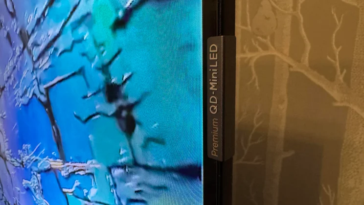 The Premium QLED-Mini LED badge on the side of the TCL C6KS Mini LED TV's panel