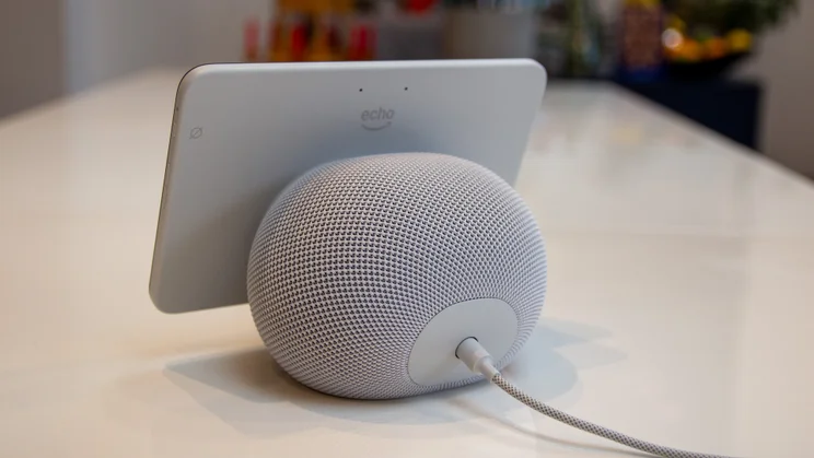 The Amazon Echo Show 8 (4th gen, 2025) pictured from the rear right on a white table