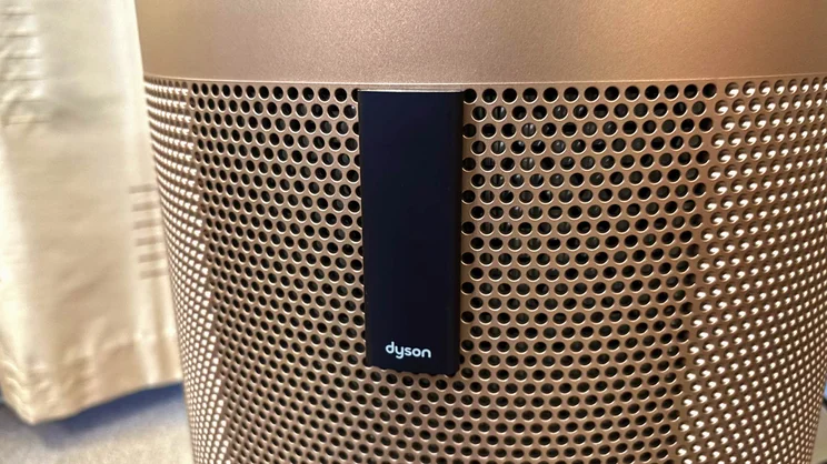 A closeup of the Dyson Big+Quiet Formaldehyde air purifier's magnetic remote storage panel, with remote mounted