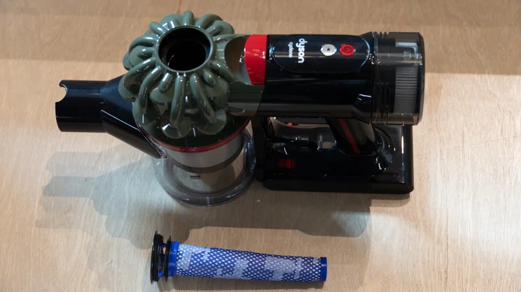 The handle of the Dyson V8 Cyclone vacuum cleaner, with filter removed