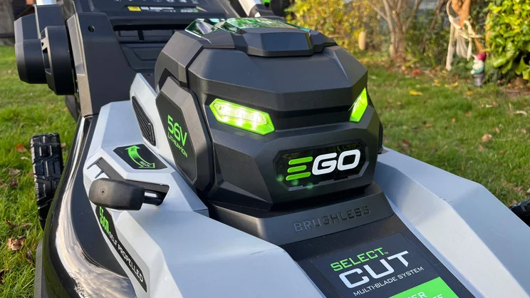 A closeup of the LM2236E-SP lawn mower's battery housing