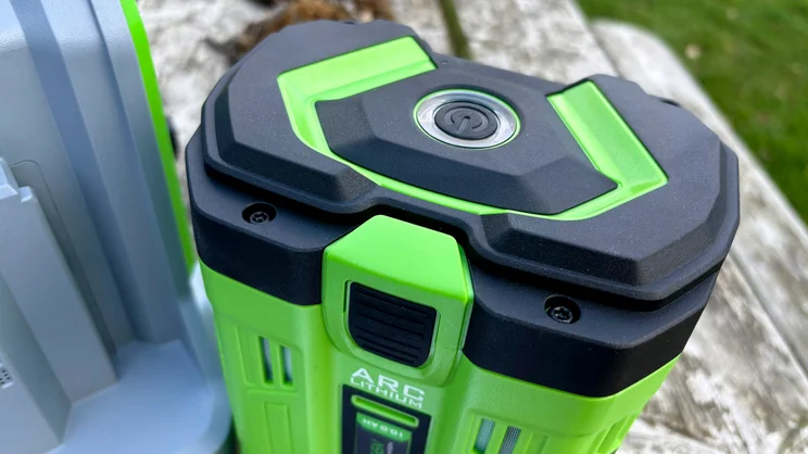 A closeup of the LM2236E-SP lawn mower's battery