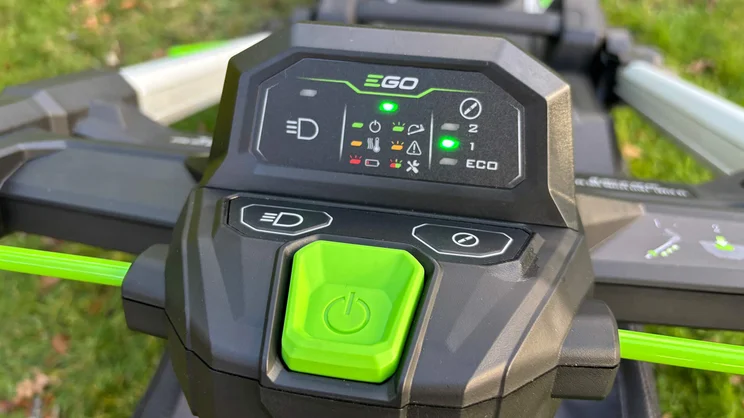 A closeup of the LM2236E-SP lawn mower's controls