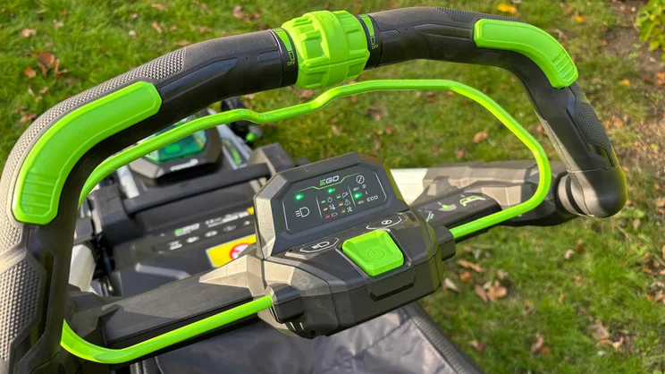 A closeup of the LM2236E-SP lawn mower's handle