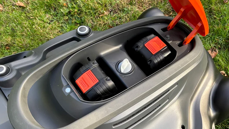 The Flymo 36V Ultramow 460 Duo's battery housing, with batteries inserted