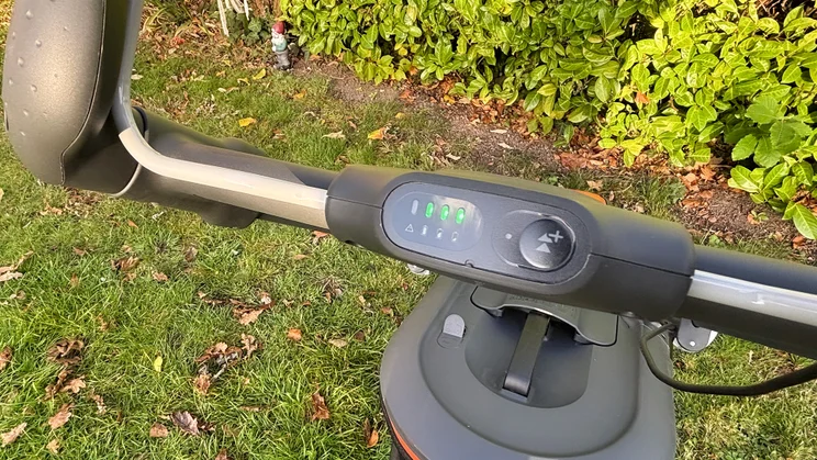 A closeup of the Flymo 36V Ultramow 460 Duo's controls