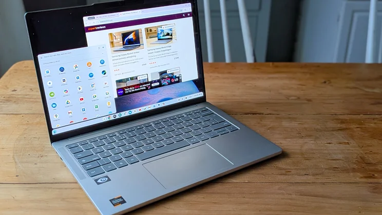 The Lenovo Chromebook Plus 14 Gen 10, open pictured from the left on a kitchen table