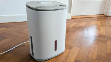 The Meaco Arete One 6L dehumidifier on a hardwood floor
