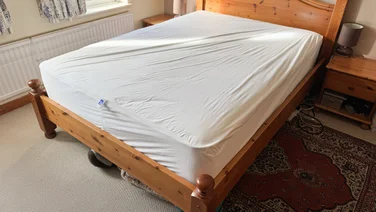 The Nectar mattress protector on a mattress