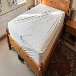 The Nectar mattress protector on a mattress