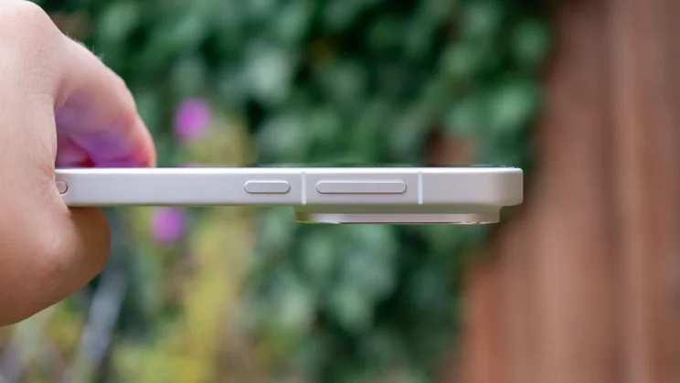 Oppo Find X9 Pro in hand, showing power and volume buttons