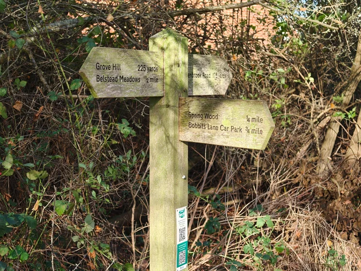A wooden signpost