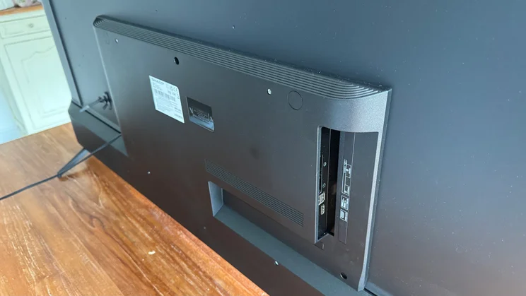 Rear, angled view of the Sharp GK4245K TV on a wooden table