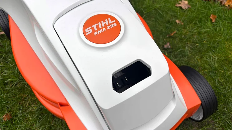 A closeup of the top of the Stihl RMA 235 lawn mower
