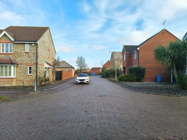 A quiet road with houses on both sides