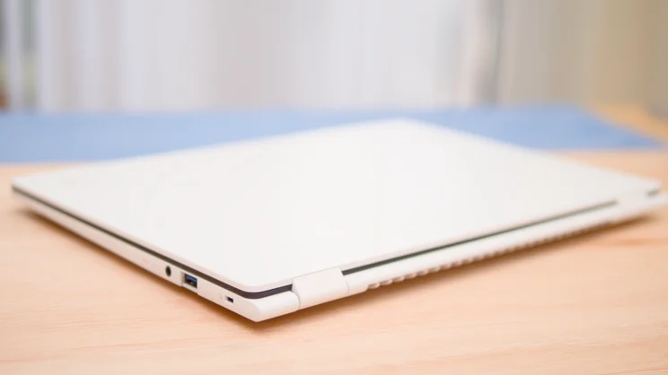 The Acer Swift Edge 14 AI, closed, viewed from the rear right quarter