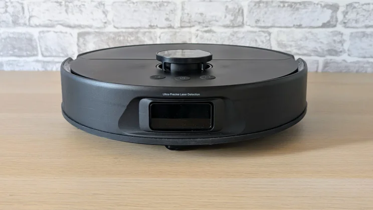 The Tapo RV50 PRo pictured from the front on a wood surface