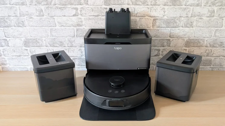 The Tapo RV50 PRo pictured in its docking station with the various internal resevoirs to either side