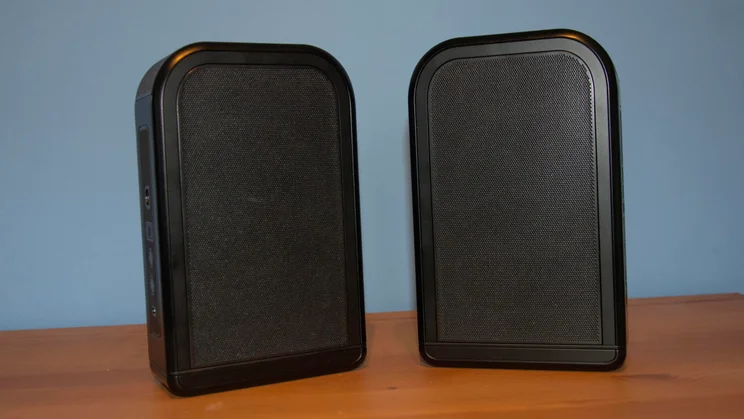 The JBL Bar 1300 MkII's detachable rear speakers stood vertically