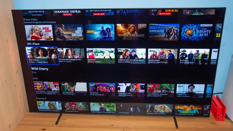 Front view of the Philips OLED760 TV displaying the content rows found in Titan OS