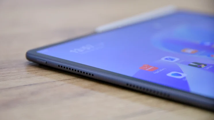A close up view of the Huawei MatePad 11.5 S (2026)'s left edge, on a wood table