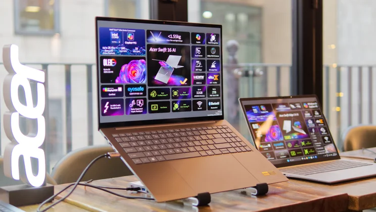 The Acer Swift 16 AI (2026) on a laptop stand with an Acer logo to the left