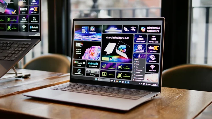 Acer Swift Edge 14 (2026), open, on a wood surface