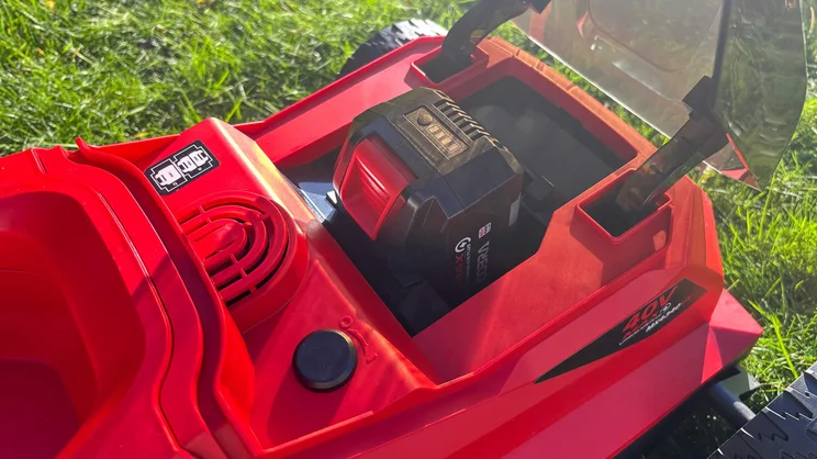 The top of the Cobra MX4340VX lawn mower with battery inserted