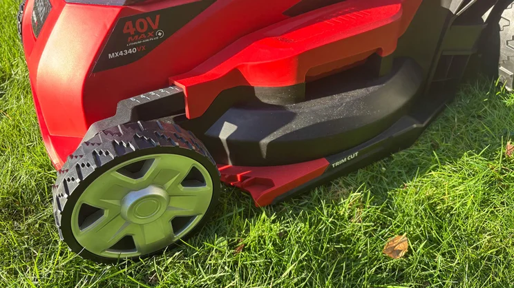 The Cobra MX4340VX lawn mower's height adjustment handle and indicator