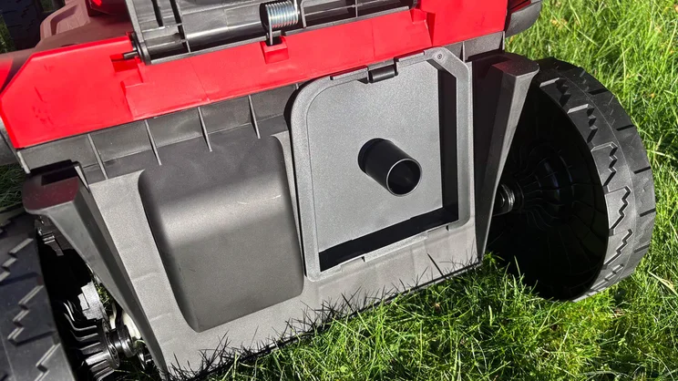 A closeup of the back of the Cobra MX4340VX lawn mower, with mulch plug installed