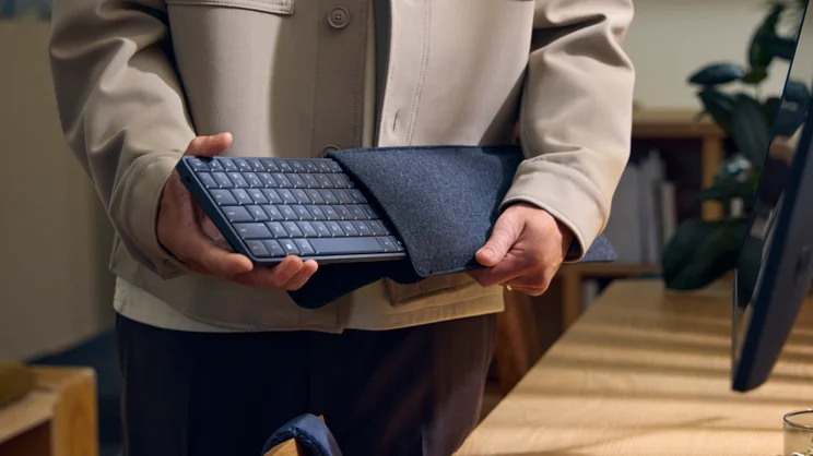 The HP EliteBoard G1a, pictured being extracted from its optional case