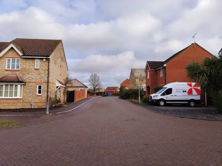 A quiet street with houses on both sides