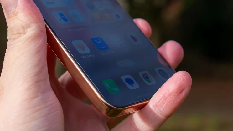 Honor Magic 8 Lite in hand, angled view