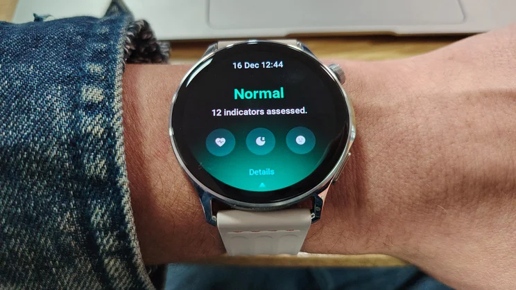 OnePlus Watch Lite on wrist, showing wellness assessment results