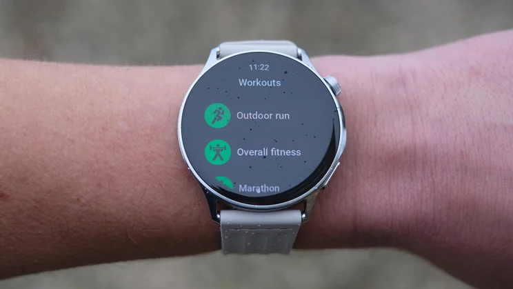 OnePlus Watch Lite on wrist, showing the selection of workouts